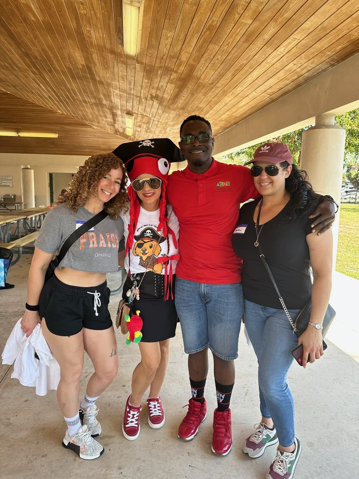 ACES staff and community members together at an outdoor community gathering